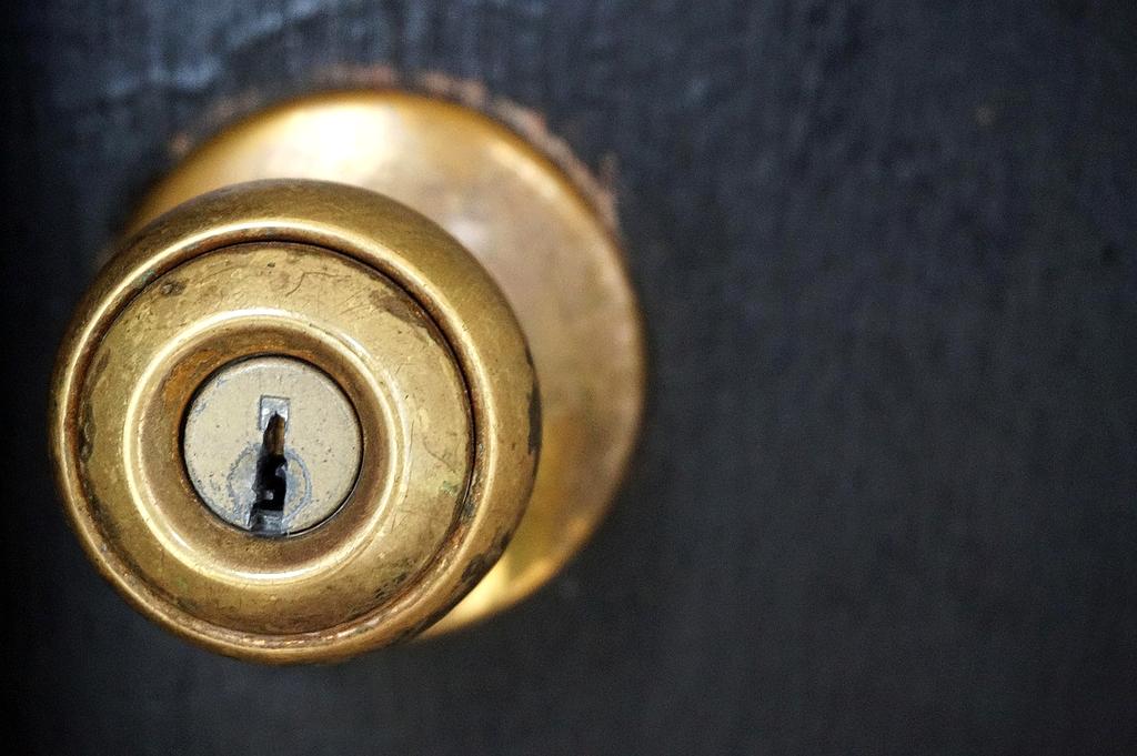 Smart home security camera and lock system on a modern front door